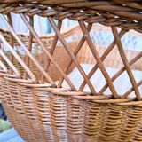 Wicker cradle on wheels