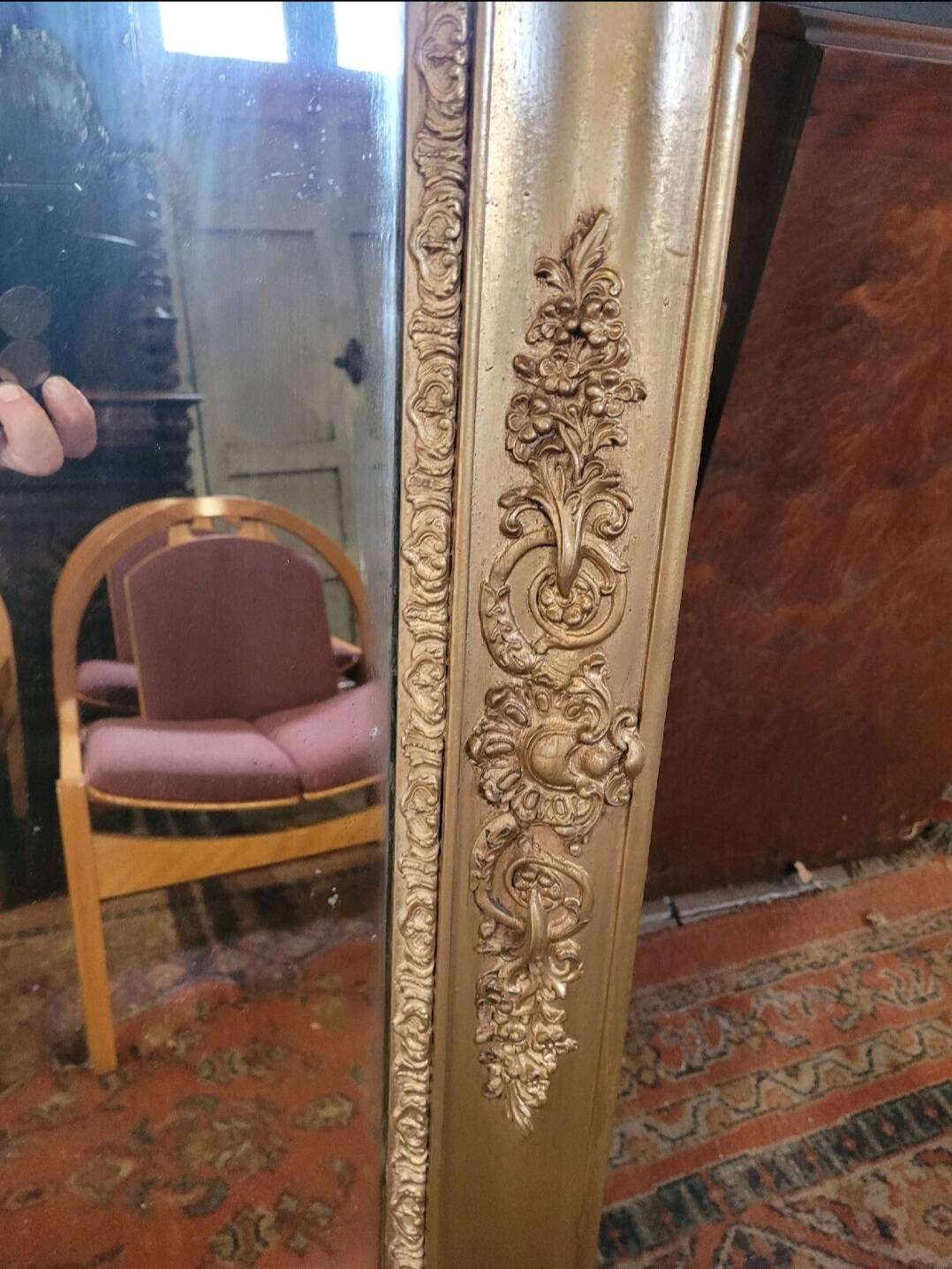 Antique gilded mirror from the 19th century, mercury mirror.