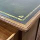Large English flat desk in mahogany with leather top, early 20th century