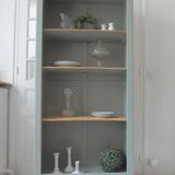 Vintage shallow bookcase re-enchanted in verdigris.
