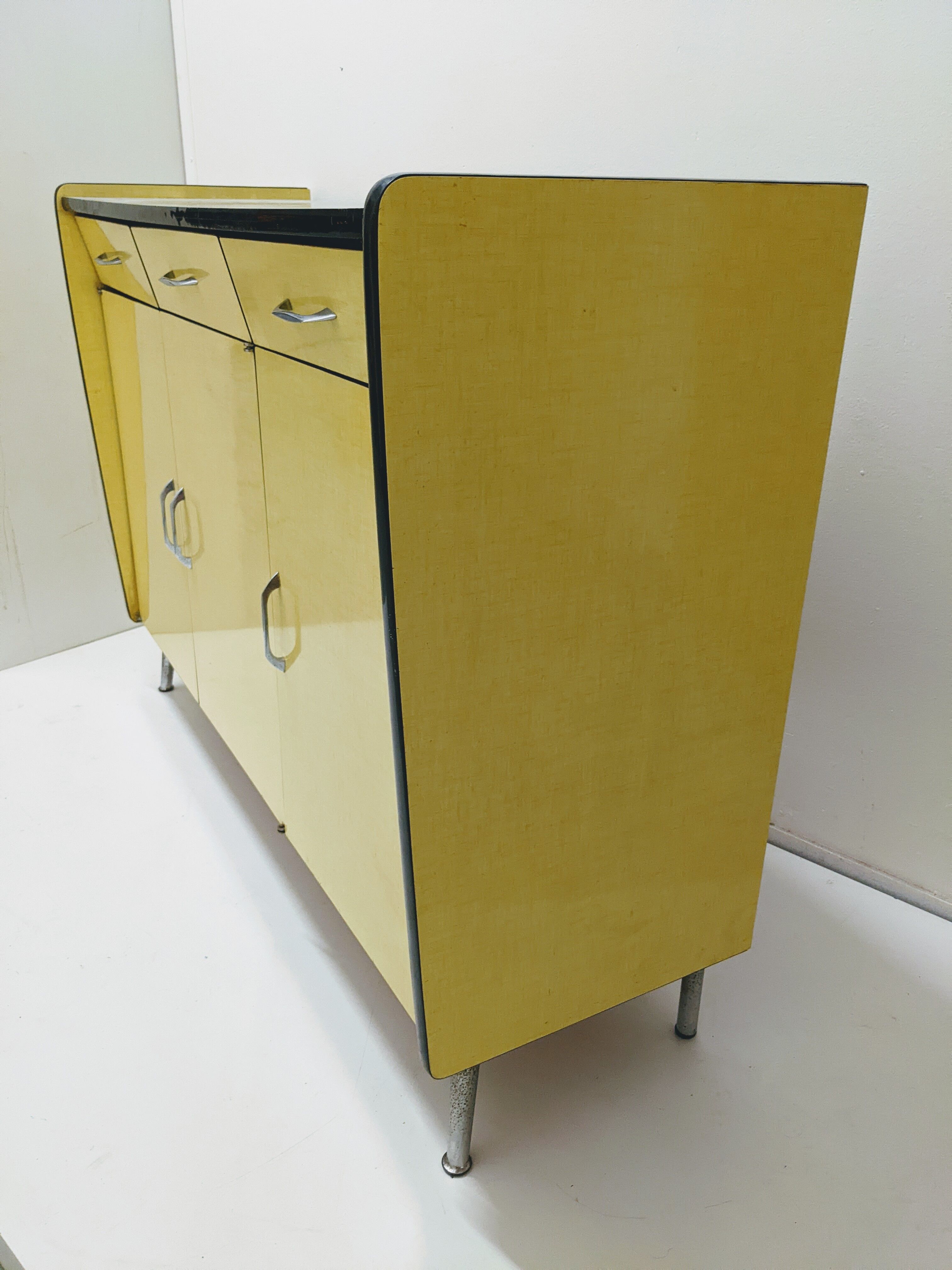 Vintage in-row sideboard in yellow formica