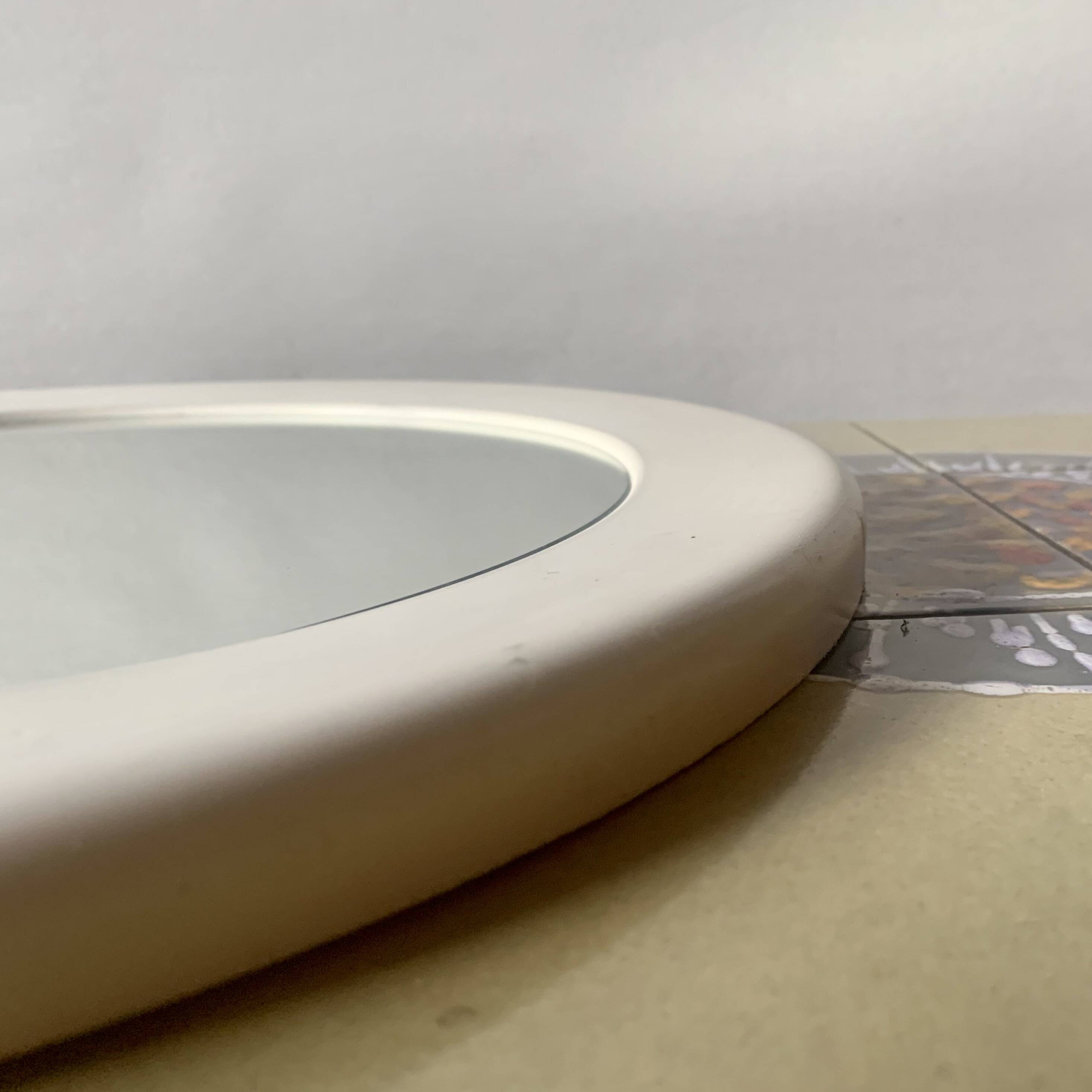 Vintage round white plastic mirror