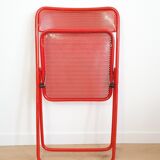 Perforated metal folding chair