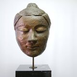 Buddha head sculpture, marble base
