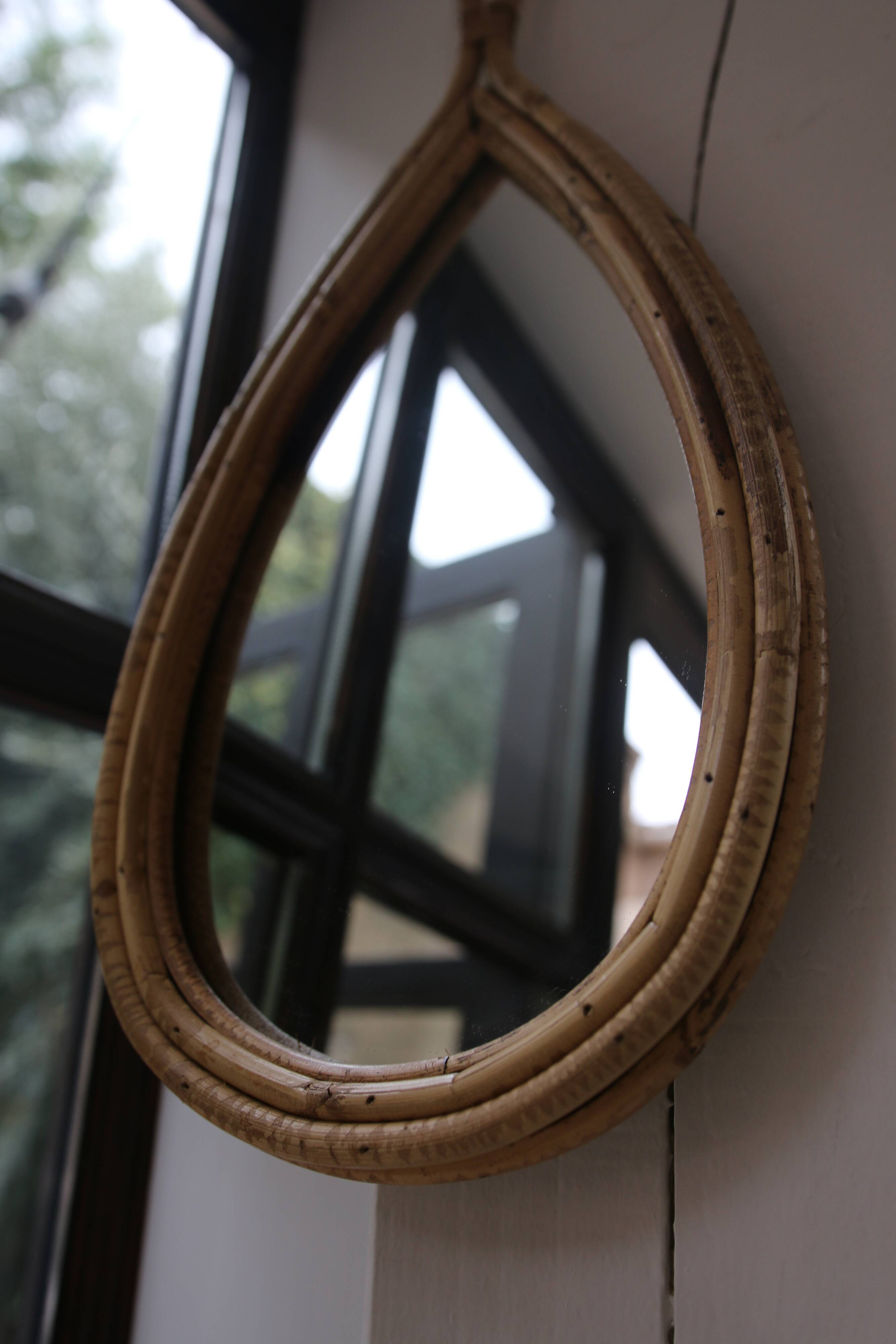 Vintage rattan teardrop mirror