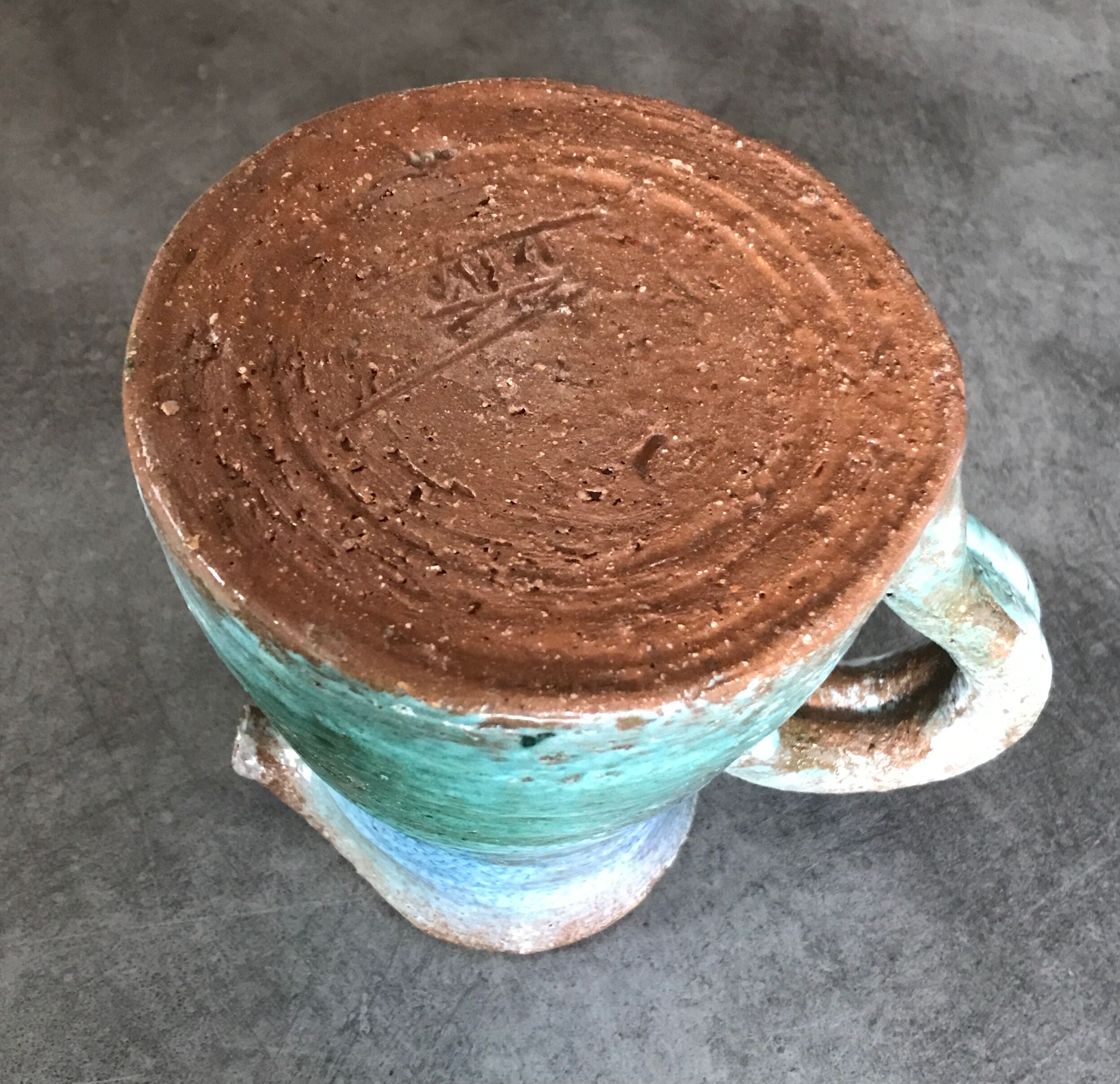 Vintage broc pitcher in enamelled sandstone with effect of blue shades, turquoise green signed
