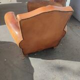 Pair of club chairs with mustaches in havana leather in their juices circa 1930
