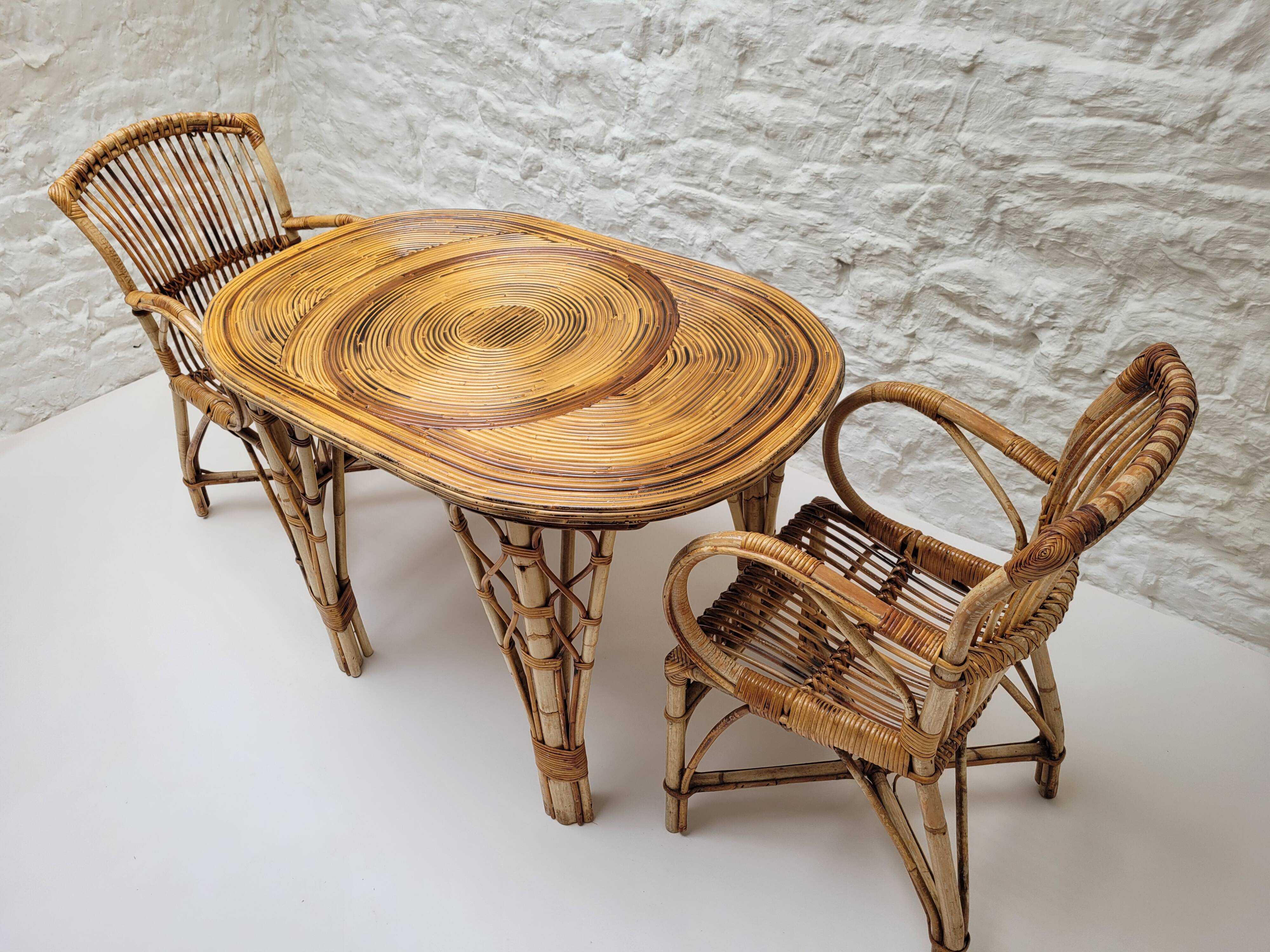 Audoux Minet duo table with bamboo rattan and smoked glass armchairs