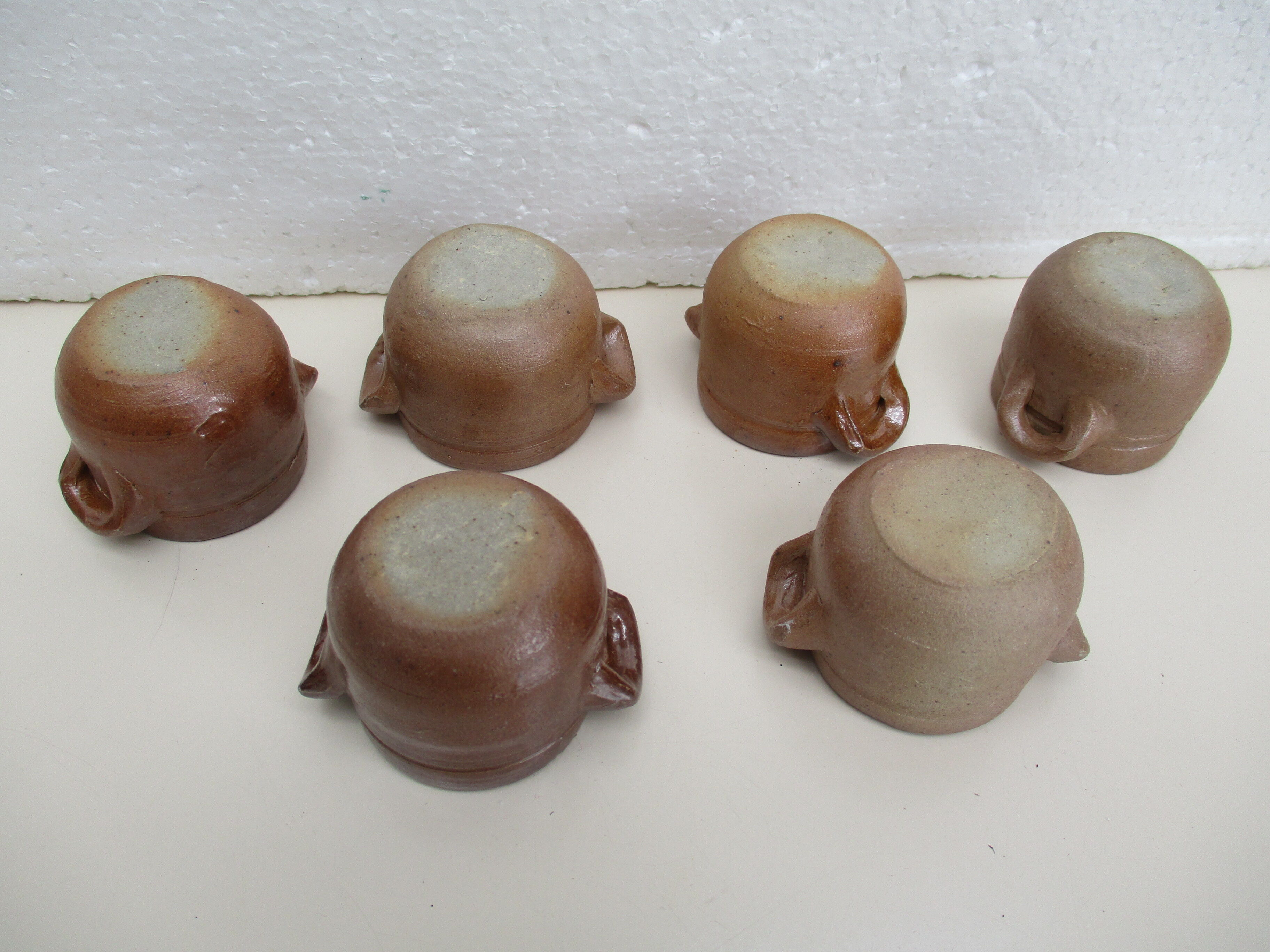 Six sandstone handle pots