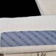 Roche Bobois leather sofa with fabric cushion
