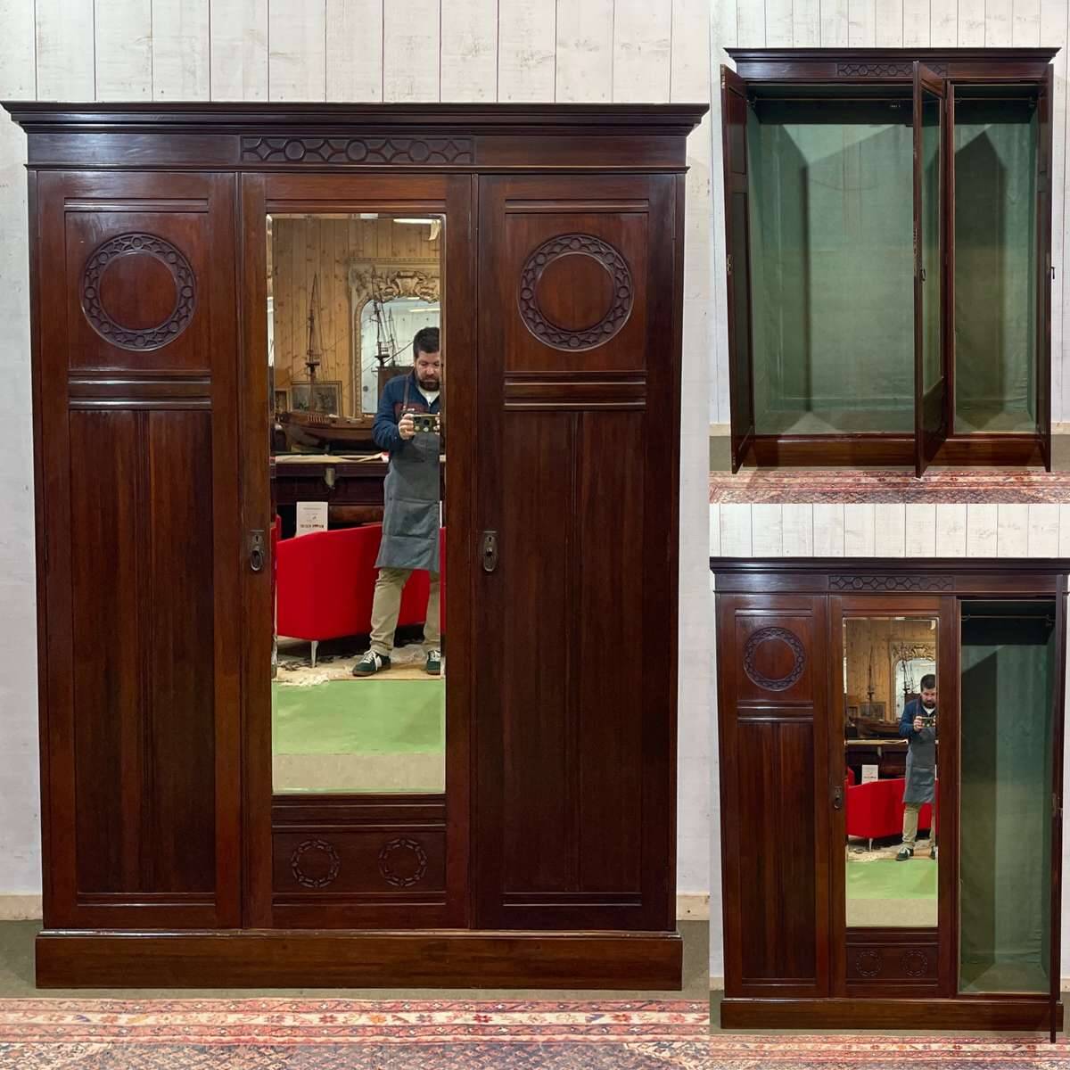 19th-century English mahogany three-door wardrobe.