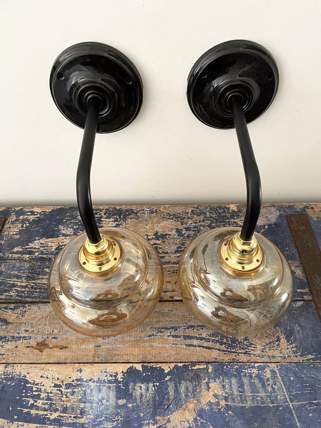Pair of vintage sconces in electrified golden glass to nine