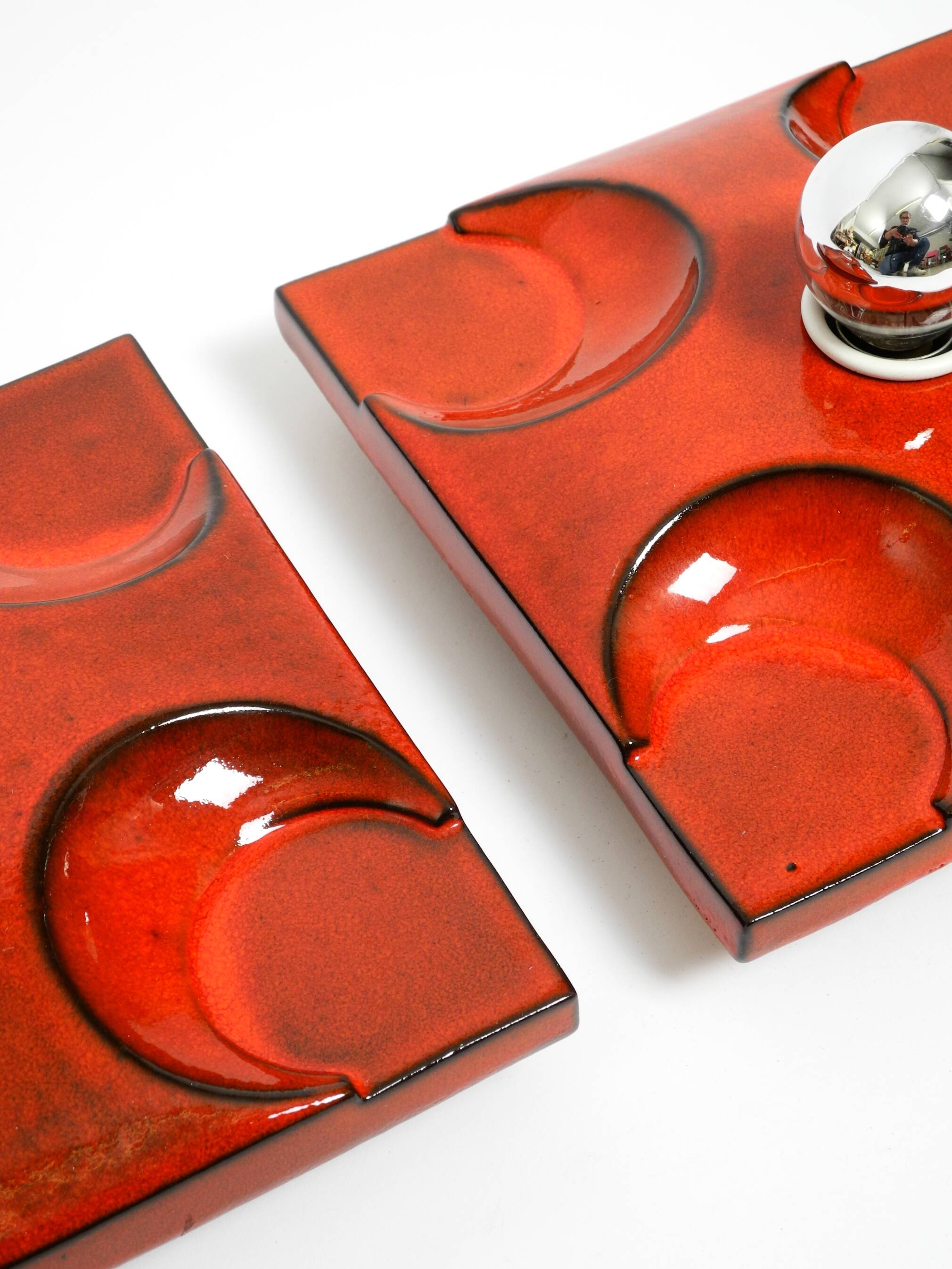 Three beautiful original 1970s Space Age red ceramic wall lamps
