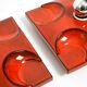 Three beautiful original 1970s Space Age red ceramic wall lamps