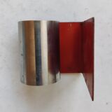 Modernist extendable bookends in brushed stainless steel and red 1970's