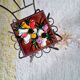 Small chair / stool in twisted wrought iron and floral ceramic.