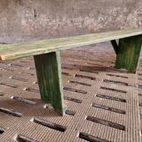 Old wooden bench side table grass green