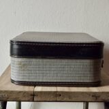 Old cardboard suitcase with its two keys