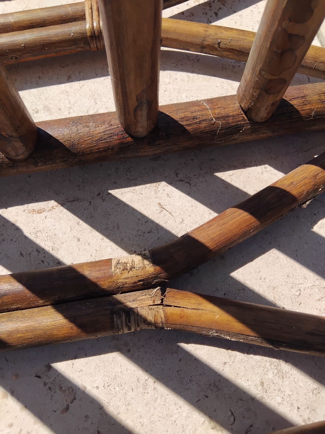 Vintage wooden garden furniture set with a bench and an armchair