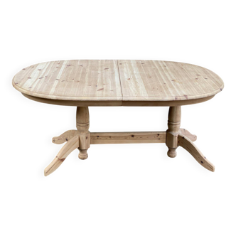 Refurbished extendable farmhouse dining table made of solid raw spruce wood