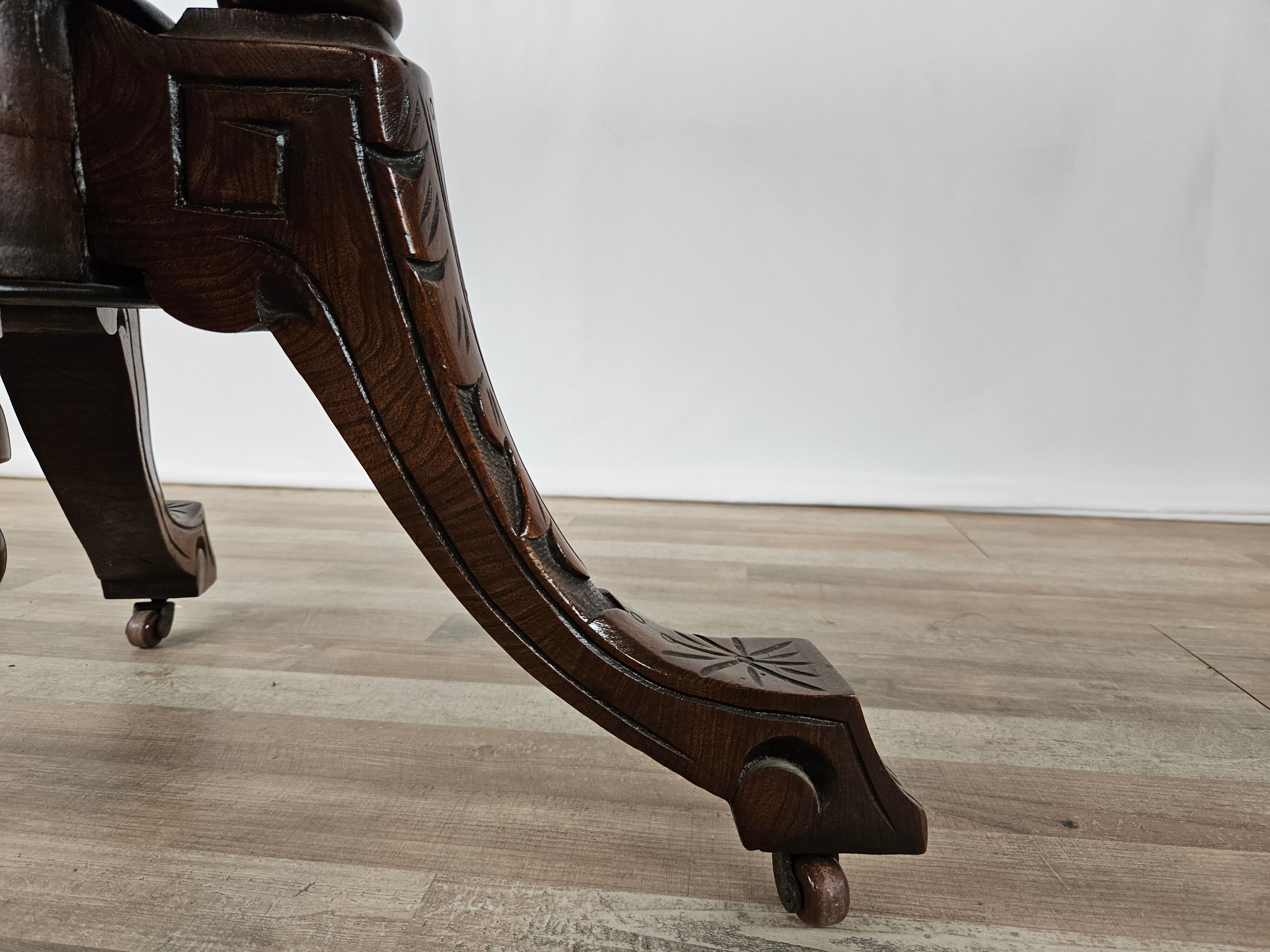 Coffee table in walnut with maple inlays and wheels