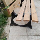 Garden bench with old cast iron legs