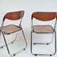 A pair of Modello Depositato folding chairs, Italy, 1970s
