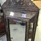 Antique mirror in repoussé and patinated copper from the Napoléon III era.