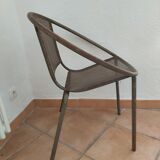 Vintage perforated metal basket armchair