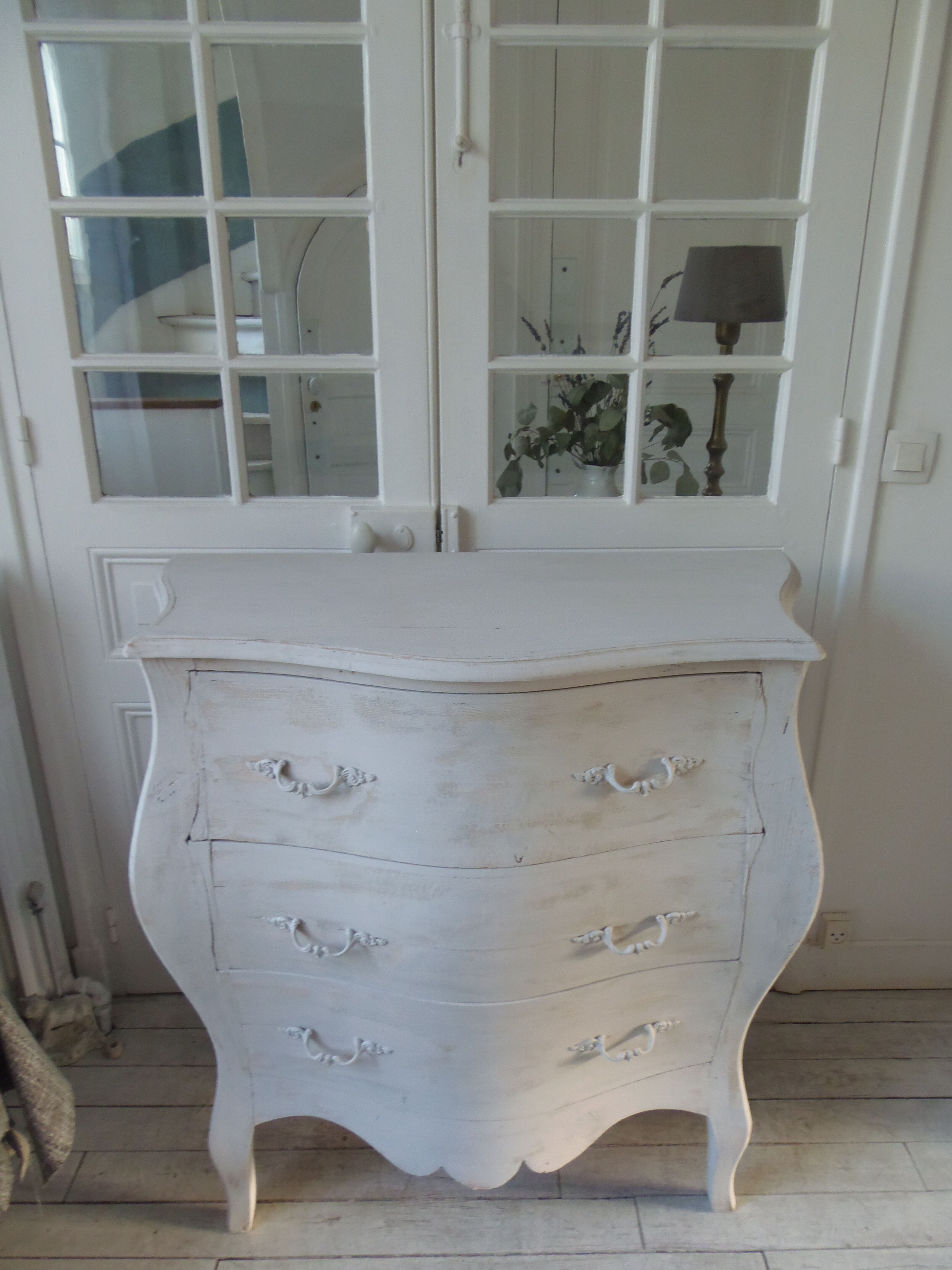 Curved patinated chest of drawers pearl grey waxed finish