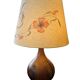 Important wooden floor lamp with a lampshade decorated with flowers from around 1970.