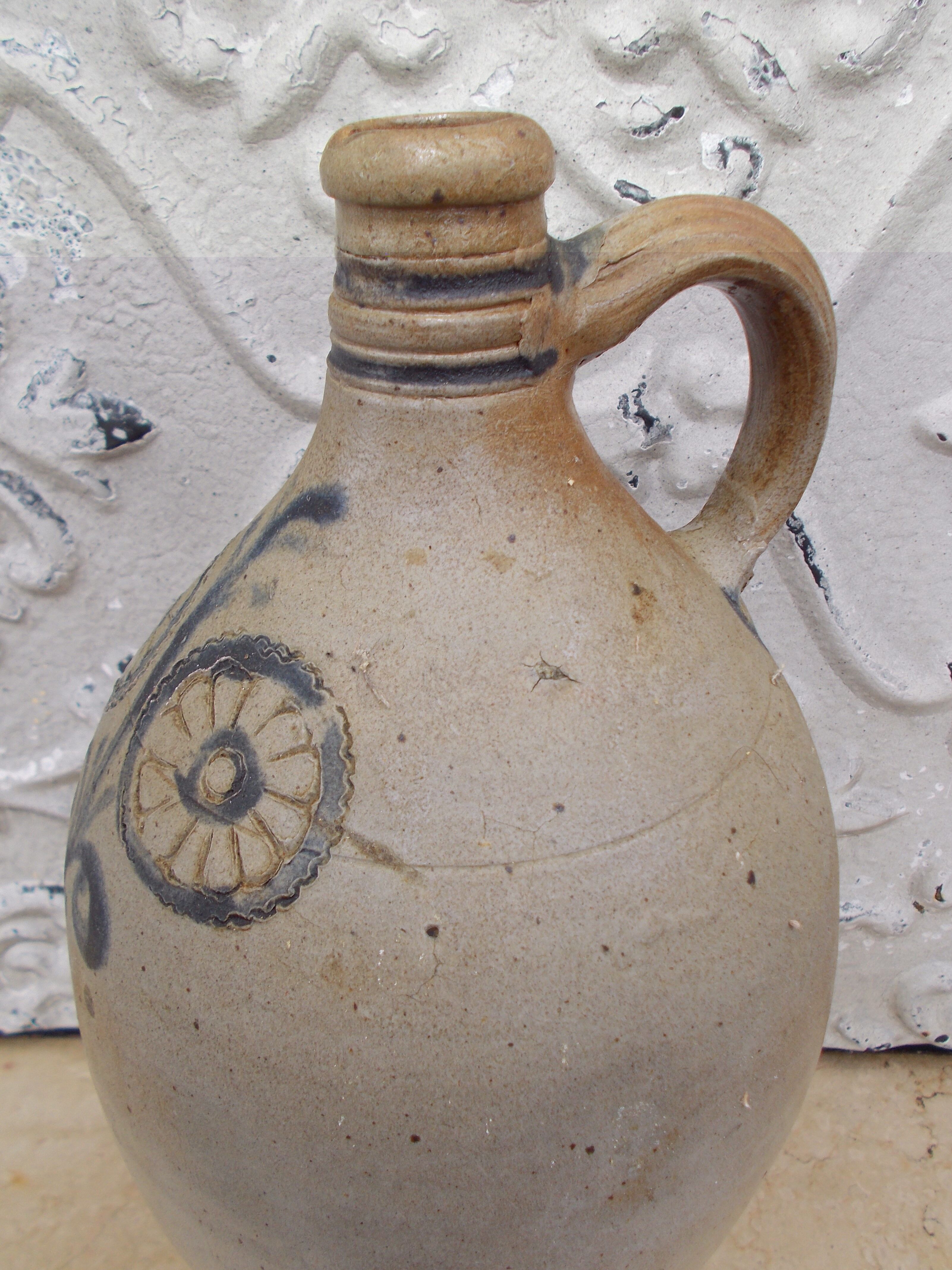 Folk art of Alsace Sandstone jug floral decoration
