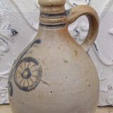 Folk art of Alsace Sandstone jug floral decoration