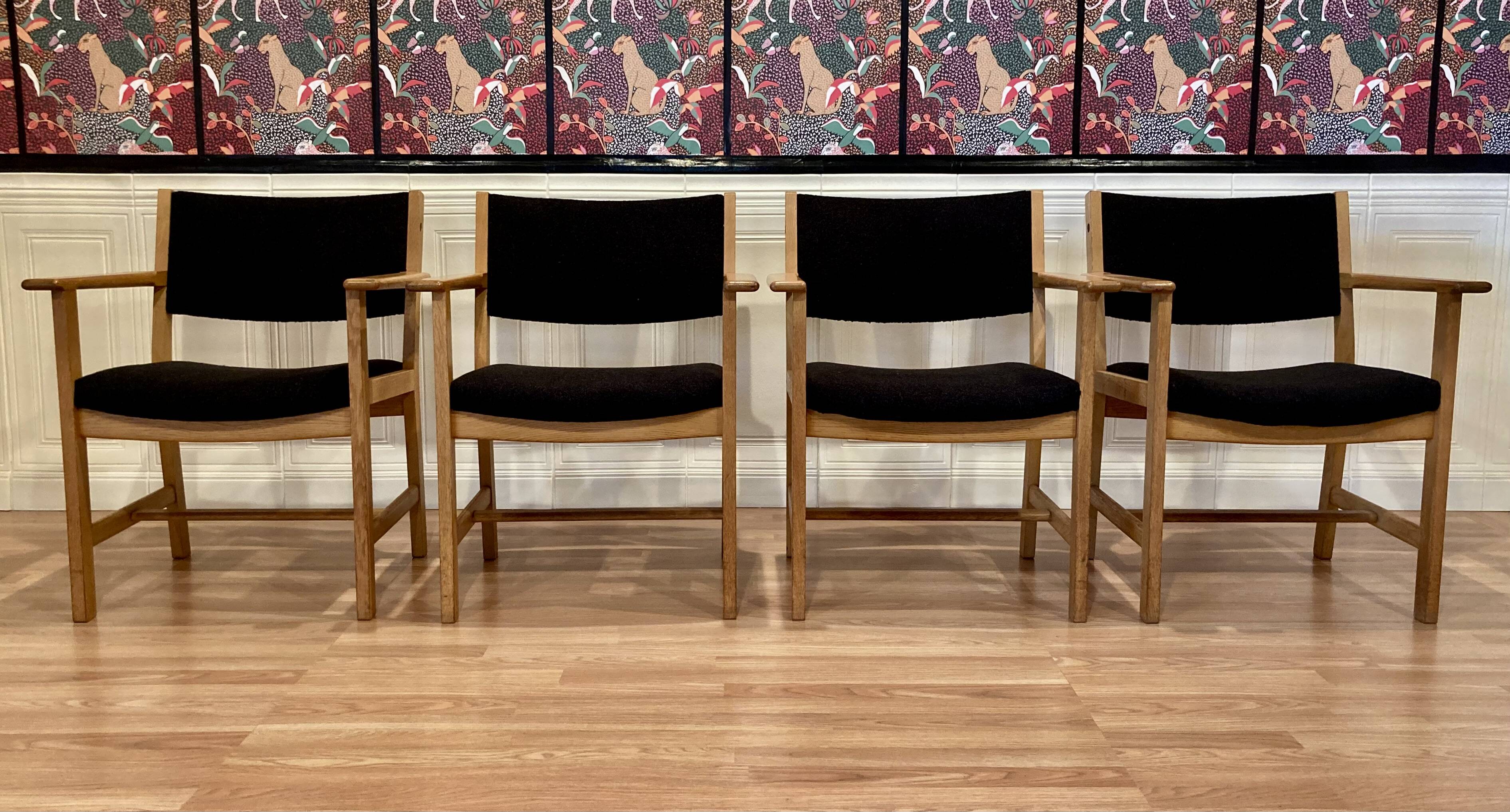 Set of 4 armchairs stamped Hans Wegner "Scandinavian design" 1960.