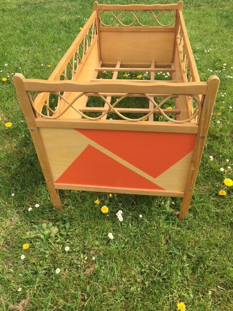 Wood and rattan baby bed