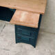 Antique desk with drawers and shelf