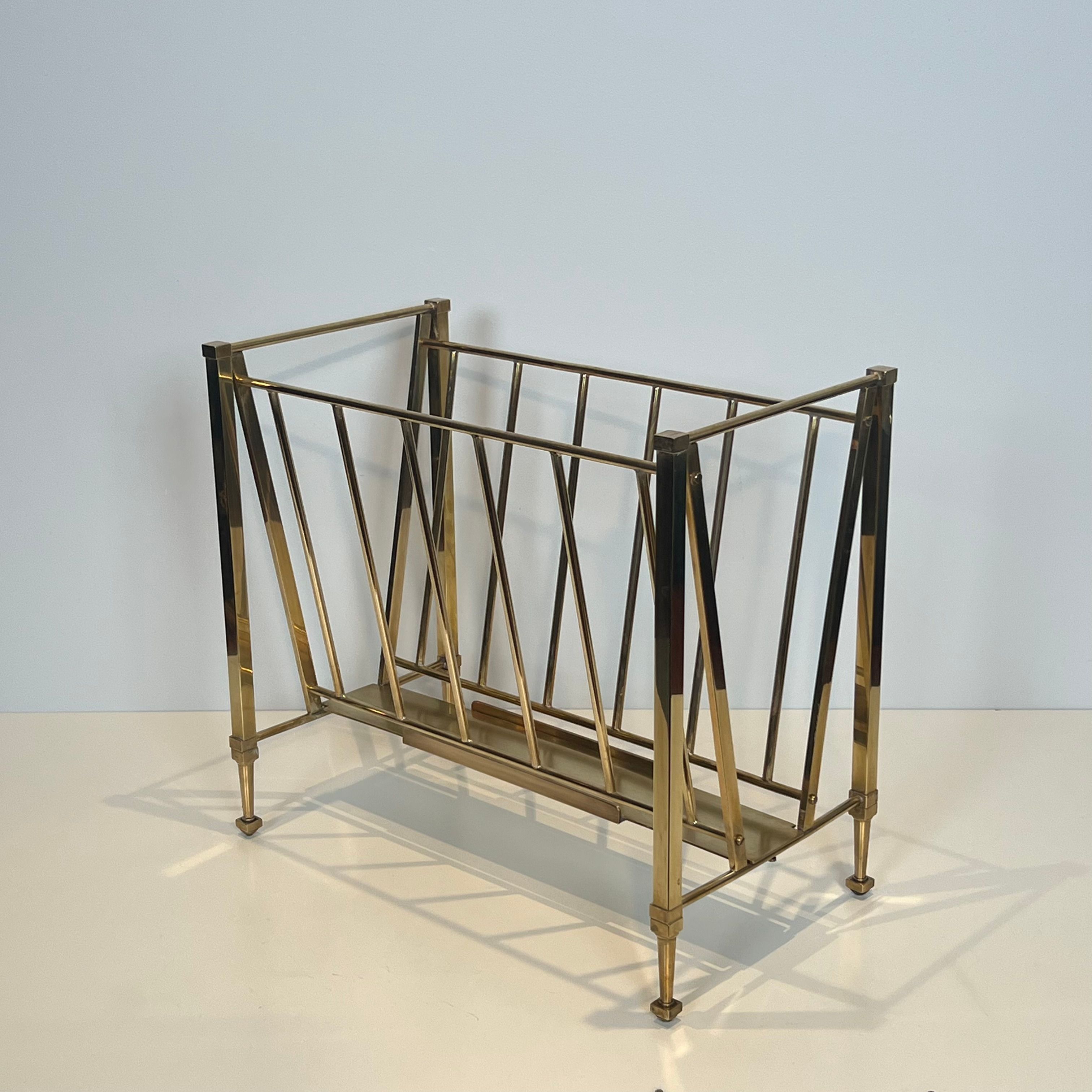 Neoclassical brass magazine rack attributed to Maison Ramsay.