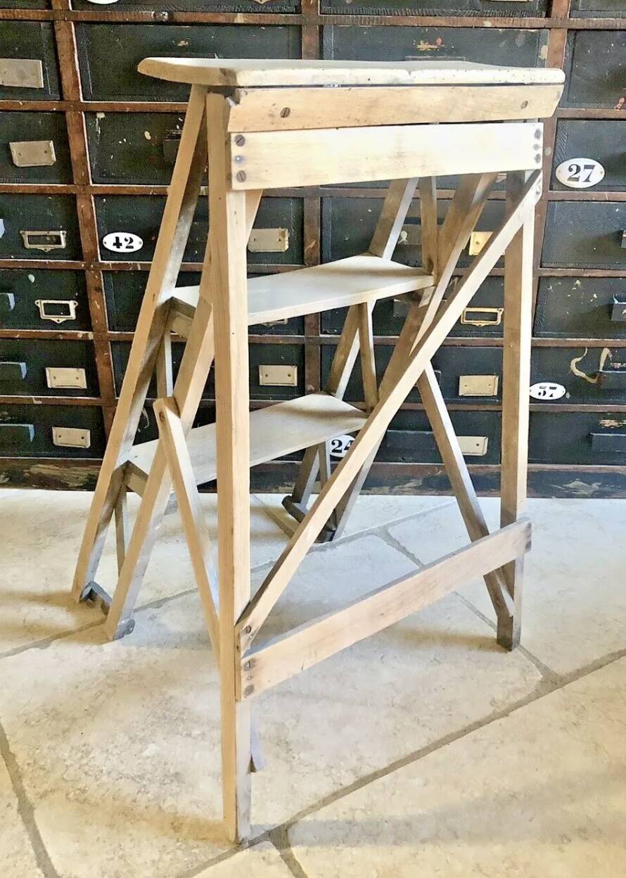 Old small painter's stepladder, wooden trade furniture, step stool