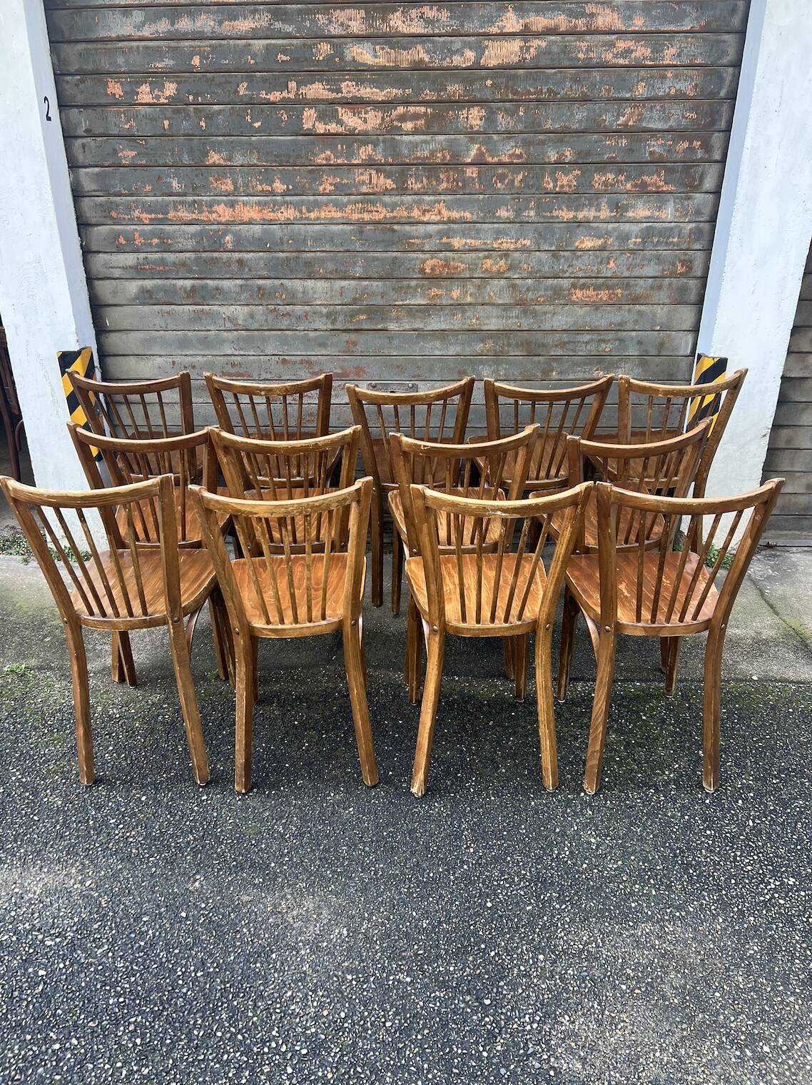 (Lot) 13 Stamped Baumann Chairs