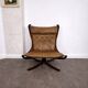 Leather armchair with a beech structure, Falcon model by Sigurd Ressel for Vatne Møbler, Denmark, 1970.