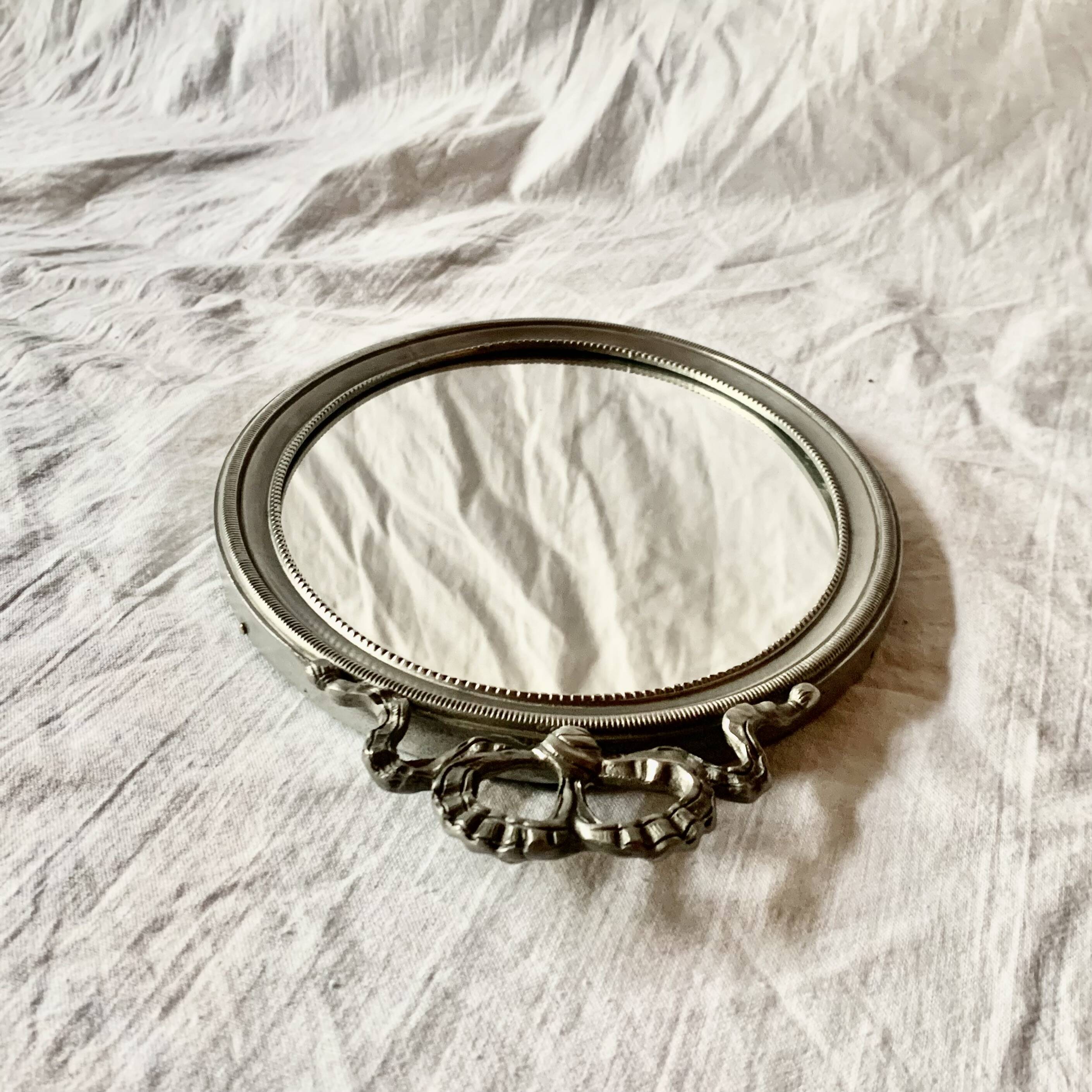 Louis XVI style oval metal wall mirror