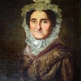 Tableau à l'huile ancien encadré d'or représentant le portrait d'une dame au chapeau