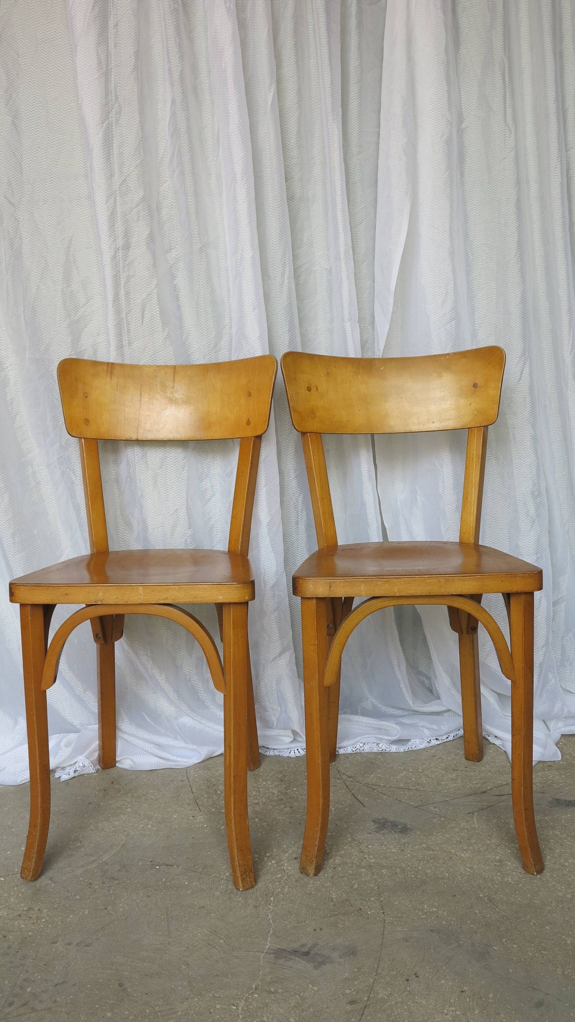 Pair of Baumann bistro chairs