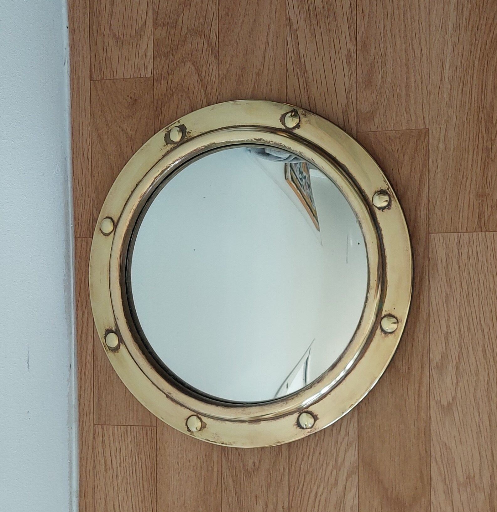 Witch porthole mirror 1940 in vintage gilded brass.