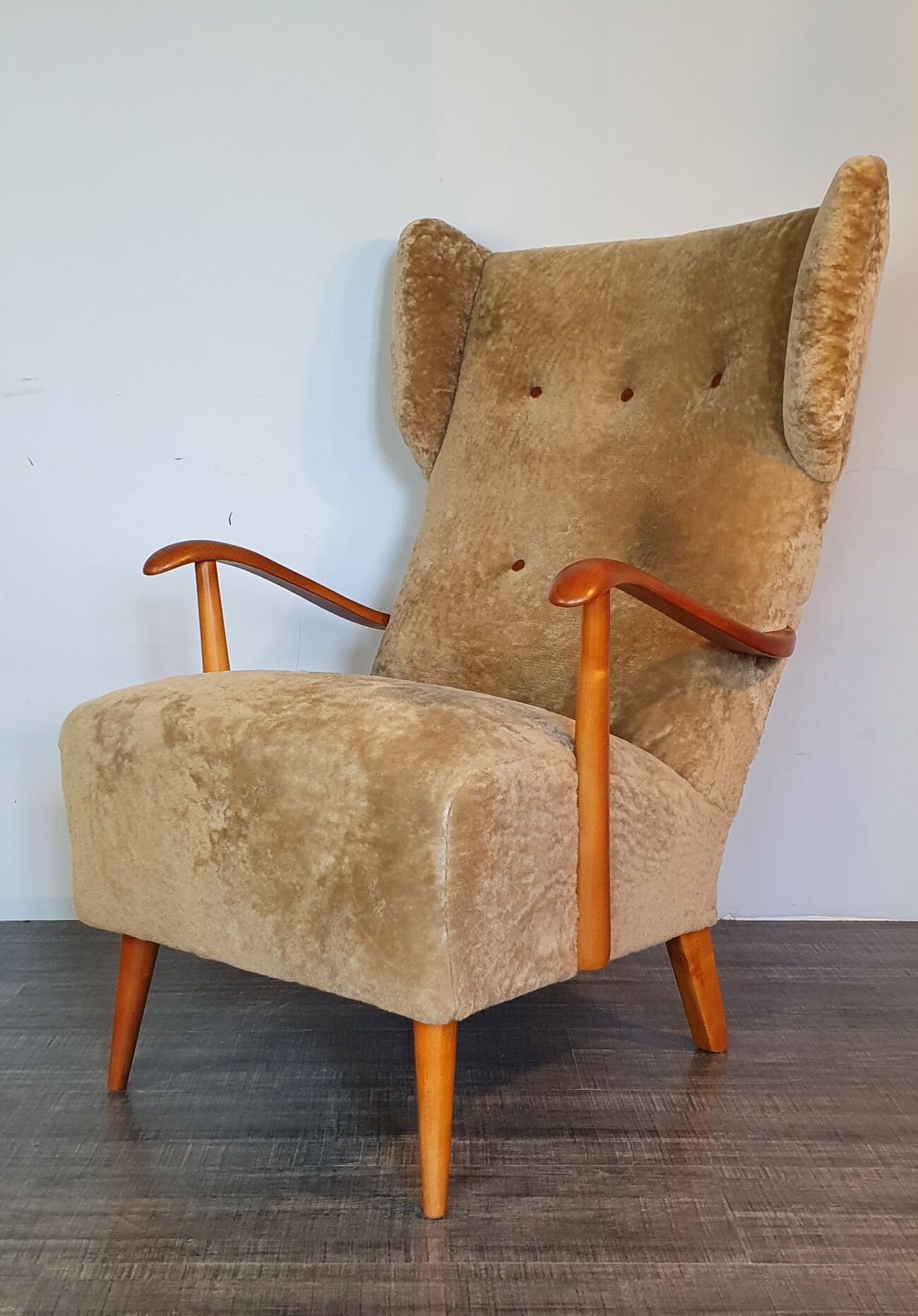 Norwegian sheepskin wing armchair with ottoman 1950