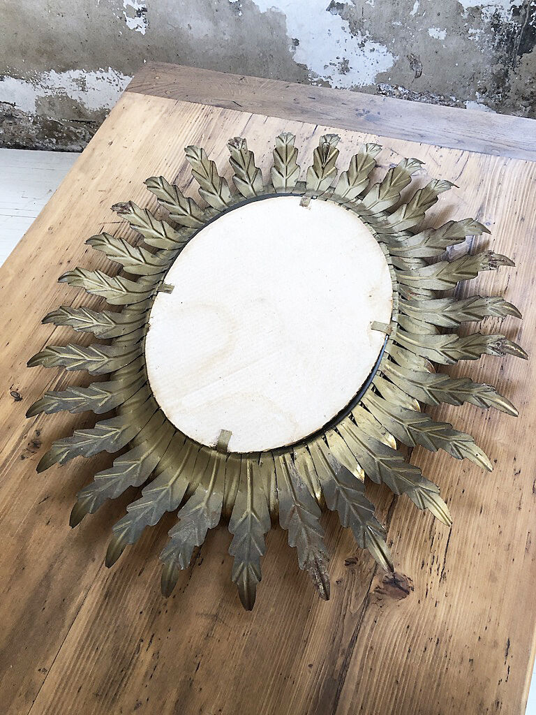 Golden mirror ancient flowery sun