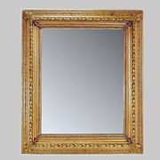 Large gilded wood and stucco mirror with foliage