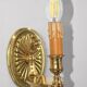 Pair of gilt bronze wall sconces in Directoire style by Lucien Gau.