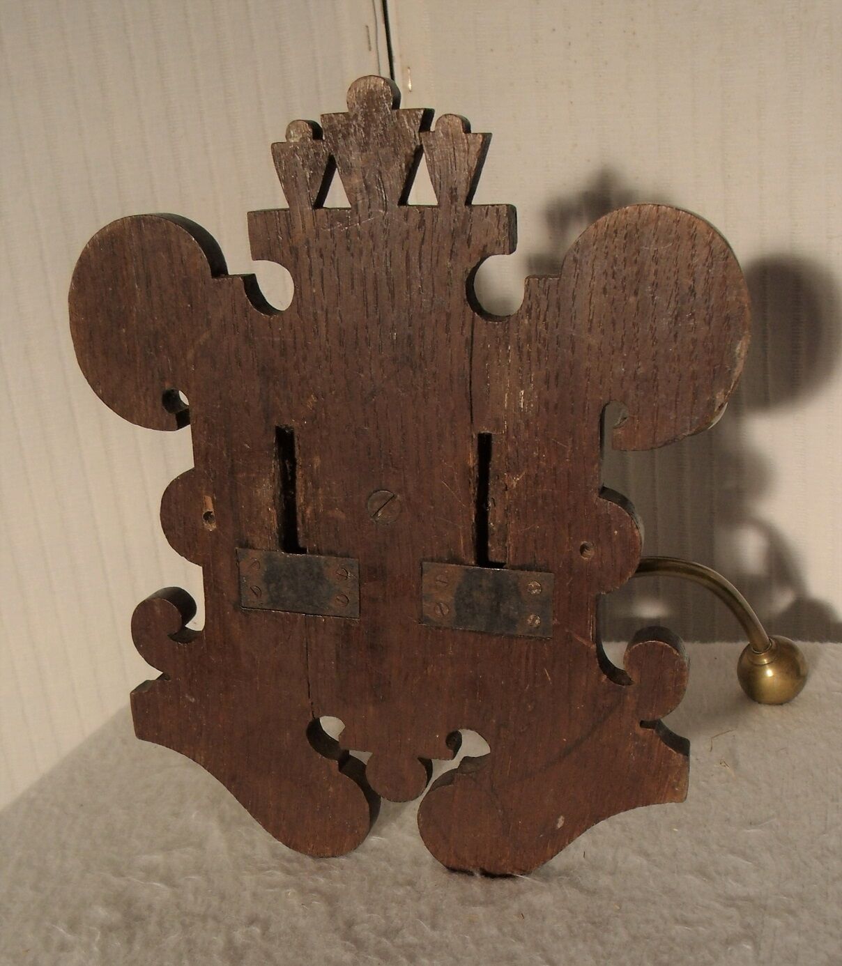 Former wooden and brass wall coat racks