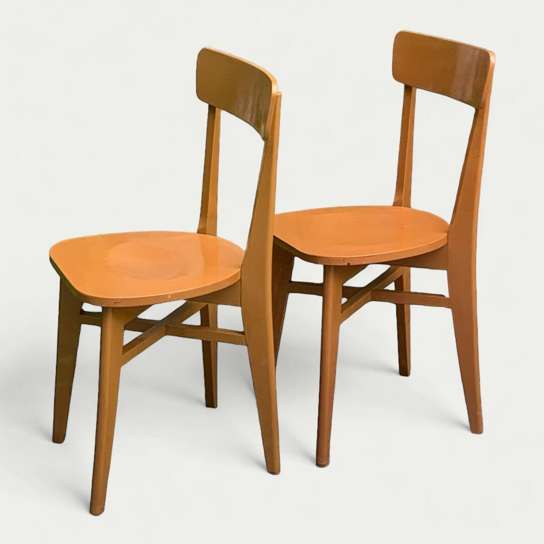 Pair of caramel bistro chairs 1950